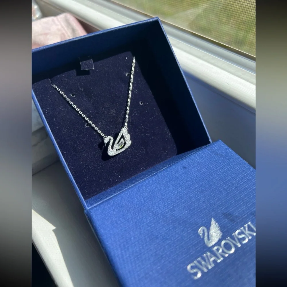 - Swan necklace white rhodium plated from swarovski